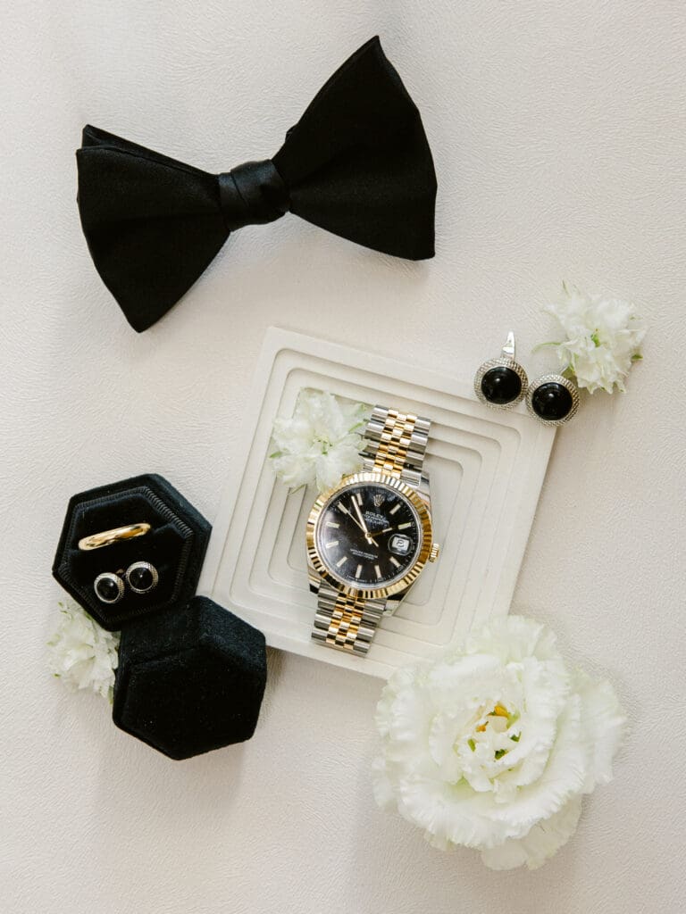 Groom preparing for elegant black-tie wedding at Airelles Saint-Tropez in South of France.