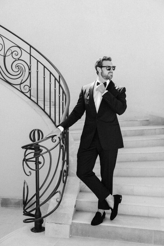 Modern groom with editorial style at luxury wedding in Saint-Tropez at Airelles.