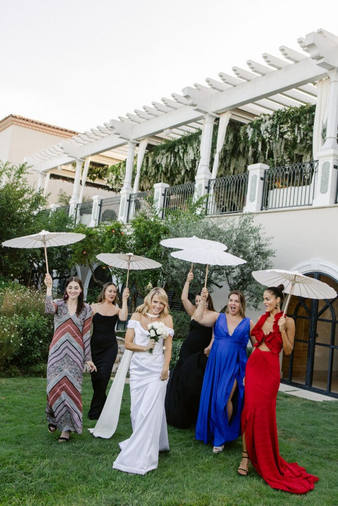 Bride and stylish guests arriving at cocktail hour during luxury wedding in Saint-Tropez.