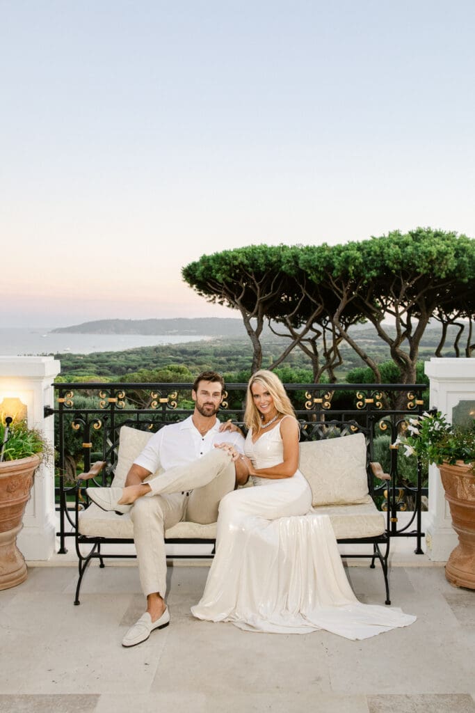Couple portrait session on the terrace of Airelles La Messardière during luxury wedding.