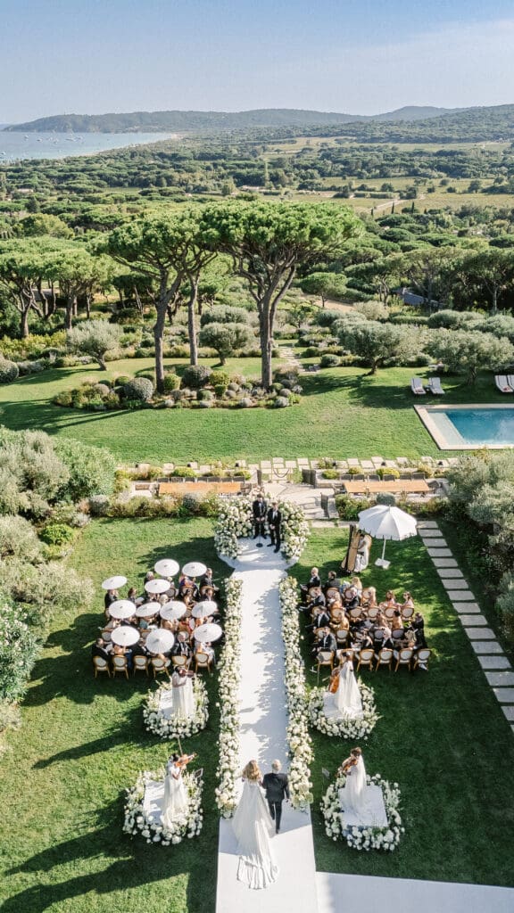 Luxury destination wedding ceremony at Airelles Saint-Tropez with scenic Riviera backdrop.