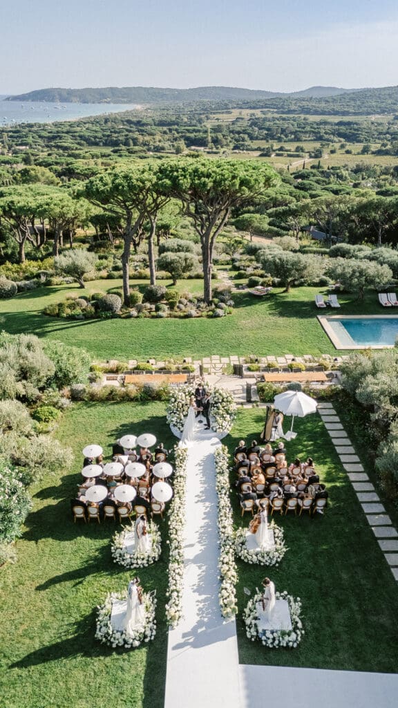 Exchange of vows during luxury wedding ceremony at Airelles La Messardière in South of France.