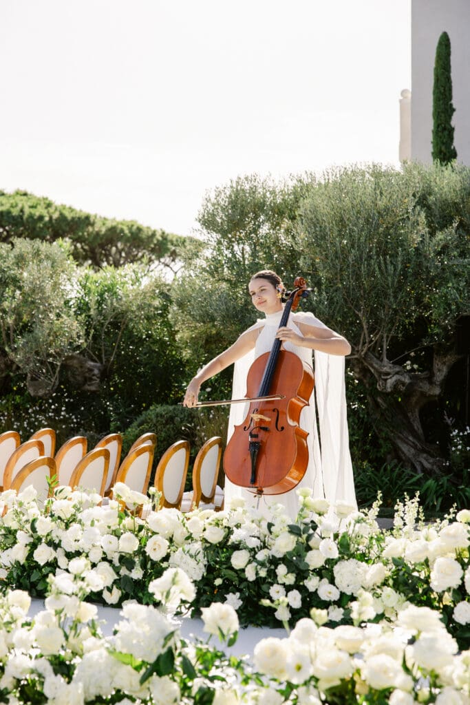 Harp and string musicians performing live at elegant wedding in Provence, France.