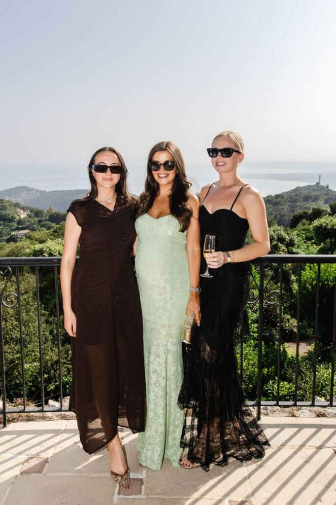 Guests celebrating cocktail hour with Mediterranean view at Mont Leuze wedding French Riviera — Marion Pinel