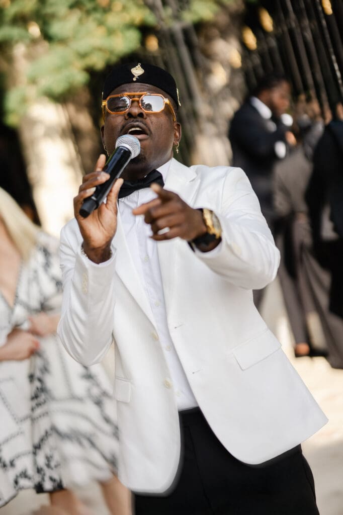 Live singer performing during cocktail hour at Domaine du Mont Leuze French Riviera wedding — Marion Pinel