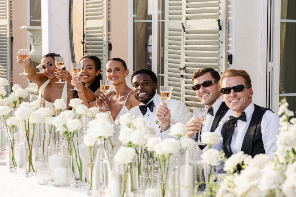 Bride and groom at head table with guests during luxury wedding reception at Domaine du Mont Leuze — Marion Pinel