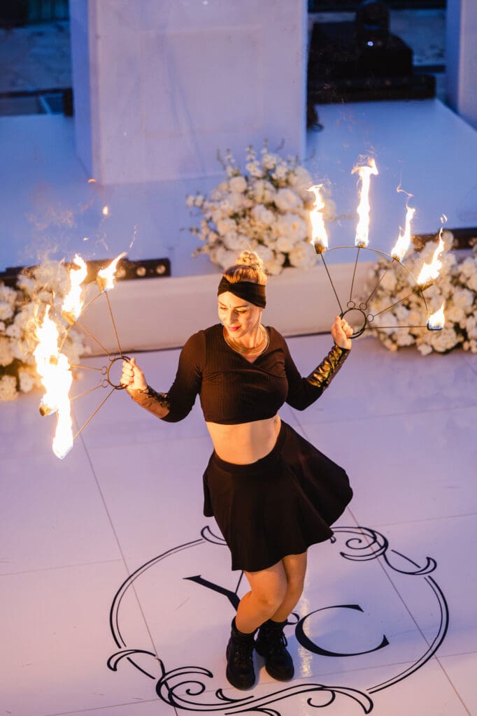 Fire dancer performing at Domaine du Mont Leuze wedding after party under the stars Côte d'Azur — Marion Pinel